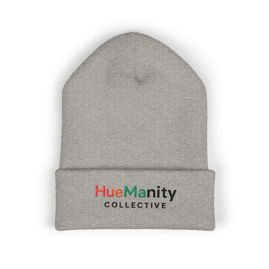 Gray beanie with 'HueManity Collective' logo on a white background