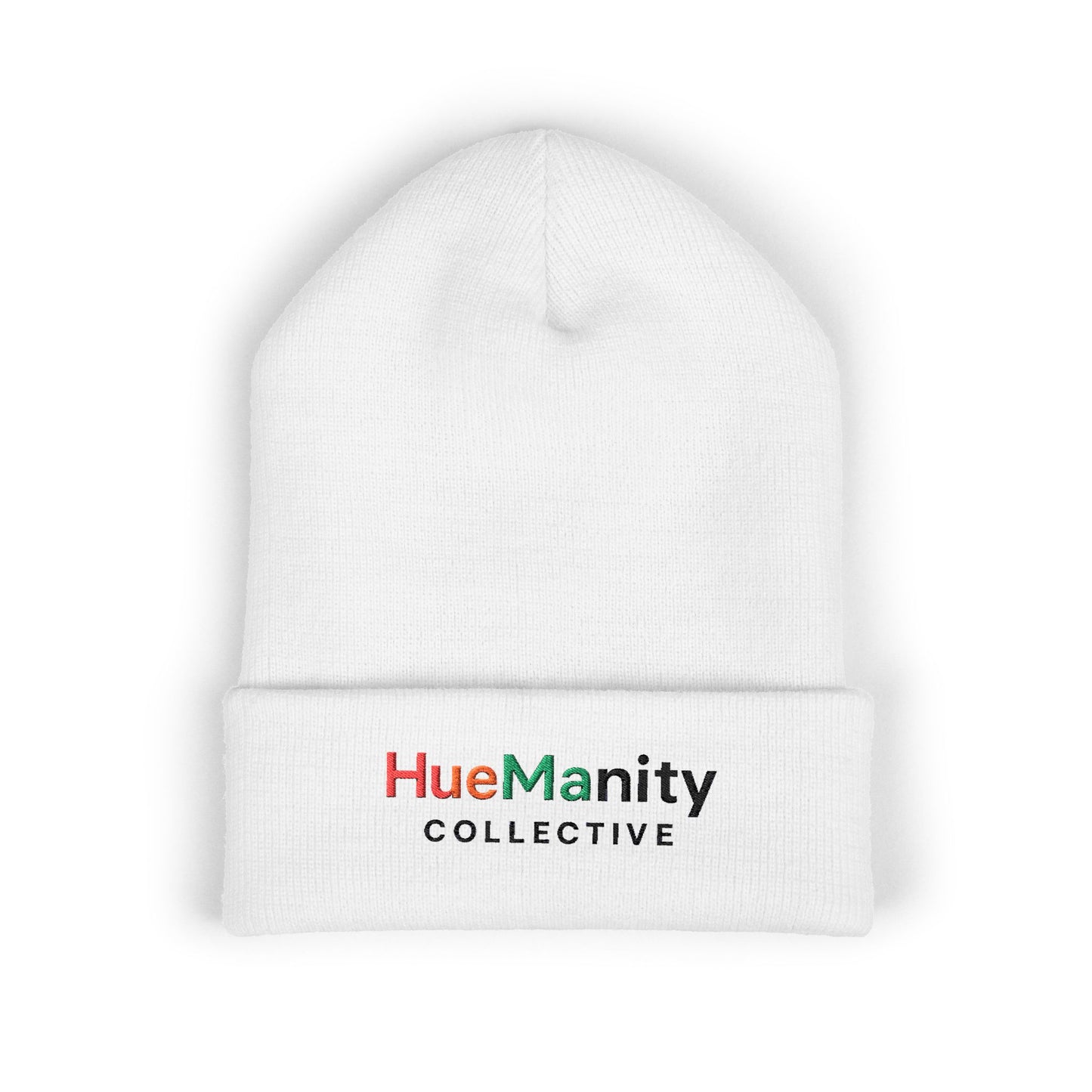 White beanie with 'HueManity Collective' logo on a white background